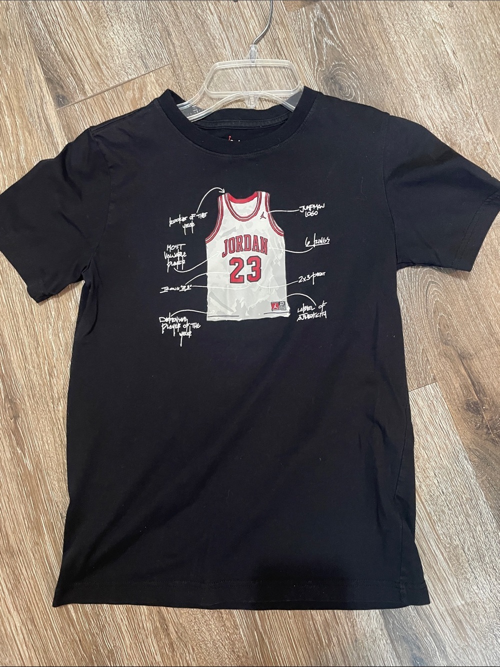 Jordan Black / white Tee shirt ( Size L for a 12-13 Years)